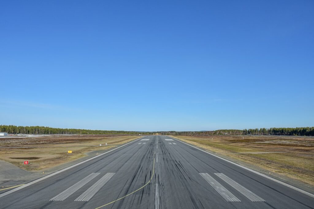 Illustrative photograph of an airport runway under a clear sky, not Aden airport or the October 28 Yemen attack