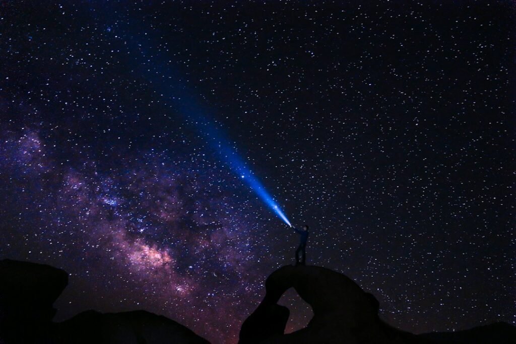 Stars and galaxy in a night sky, illustrative stock photograph, not an image from NASA Swift