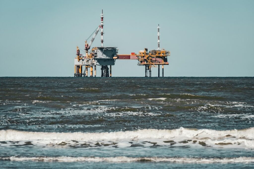 Offshore oil platform in rough seas, illustrative stock photograph; not an Equinor facility