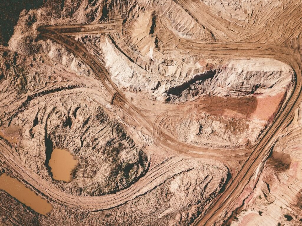 Illustrative aerial quarry landscape, not the Oyu Tolgoi copper mine or the October 29, 2026 incident.