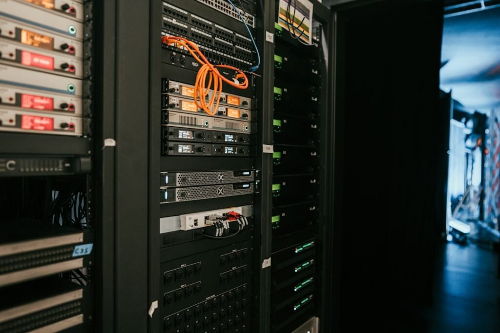 Illustrative photograph of server racks in a data center; not an Amazon or AWS facility.