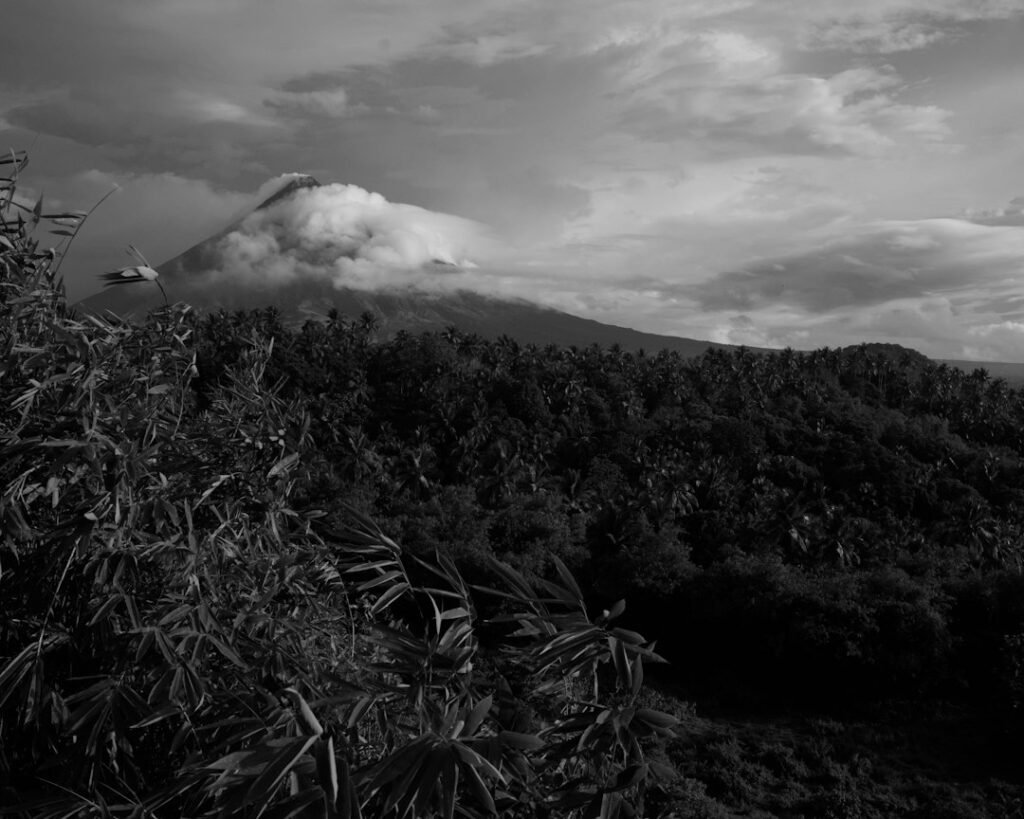 Archival black-and-white view of Mount Mayon in the Philippines, not the October 30, 2026 eruption