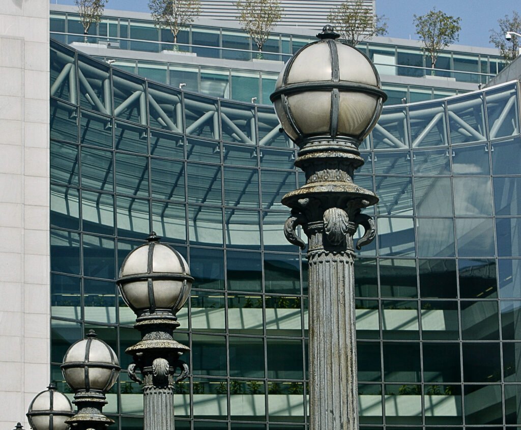 Archive photograph of the glass facade and ornate street lamps outside the U.S. Securities and Exchange Commission headquarters in Washington, D.C., photographed in 2008