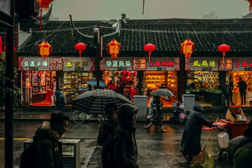 Pedestrians on a Shanghai street in China, a contextual archival photograph illustrating US-China investment relations; not the October 24 announcement